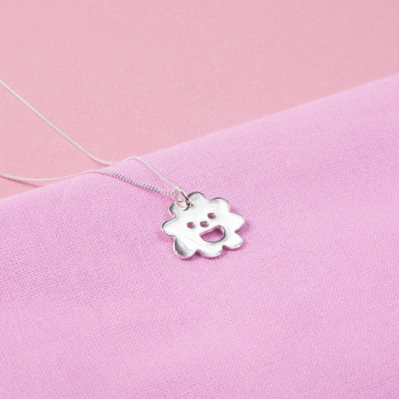 Close up of silver Smiley Flower Necklace