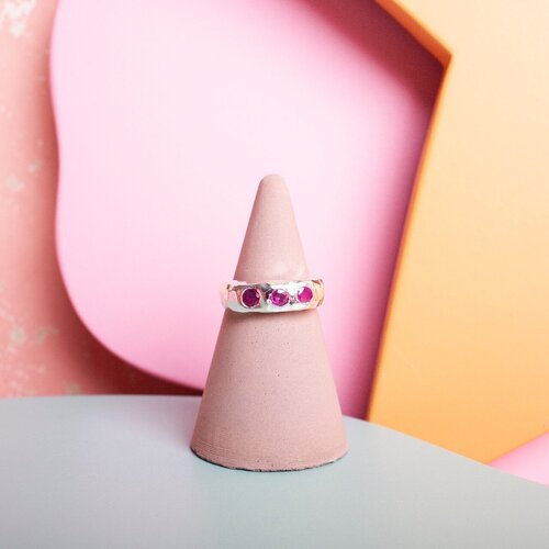 Silver ring with 3 pink gems