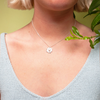 Woman wearing silver Smiley Flower Necklace