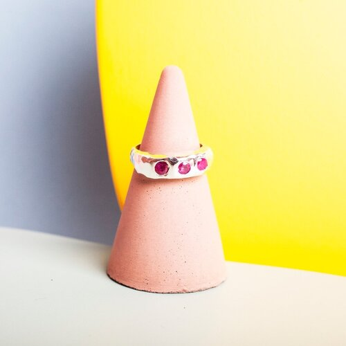 Silver ring with 3 pink gems