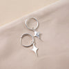 Small silver hoop earrings with a star shaped charm 