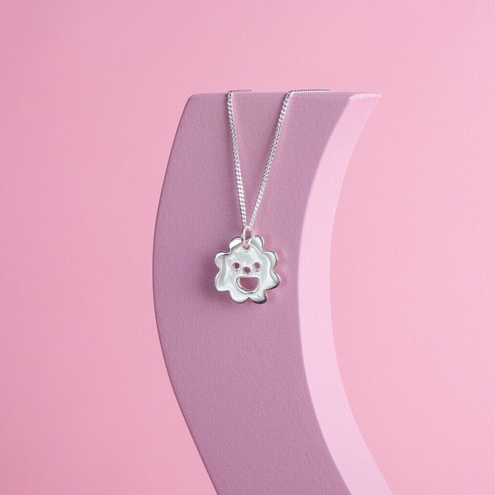 Close up of silver Smiley Flower Necklace