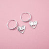 Close up of Smiley Heart Hoops earrings