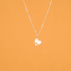 Pendant chain necklace with a smiling heart charm