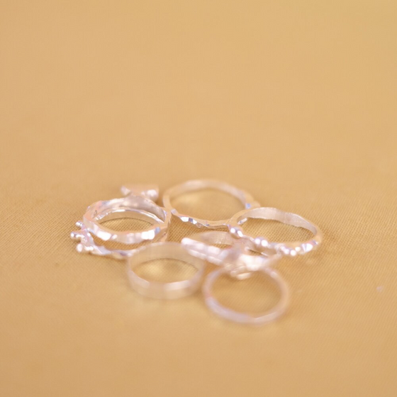 Close up of small pile of shiny silvery rings